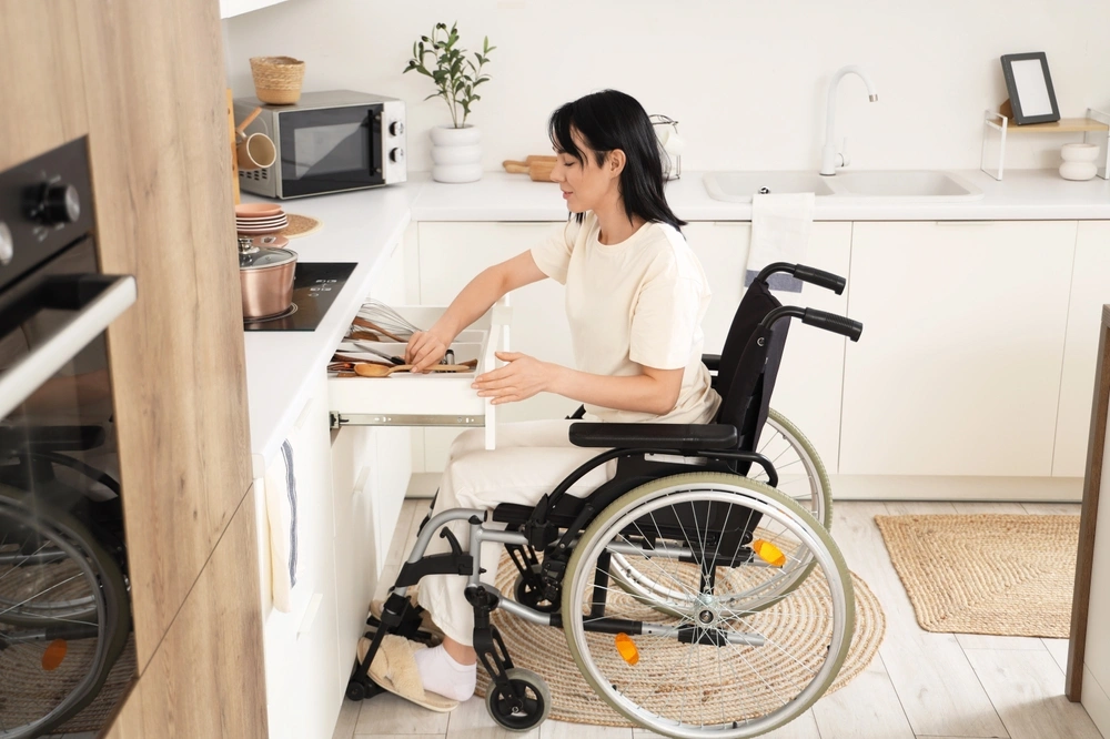 disabled women on wheelchair cooking